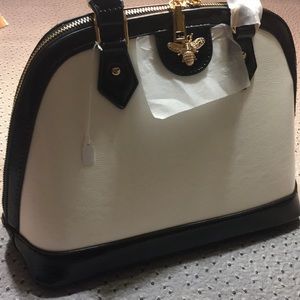 Brand new small white and black purse